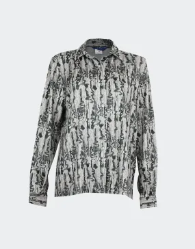 Blusa mujer punto fino cuello camisero a rayas abstractas