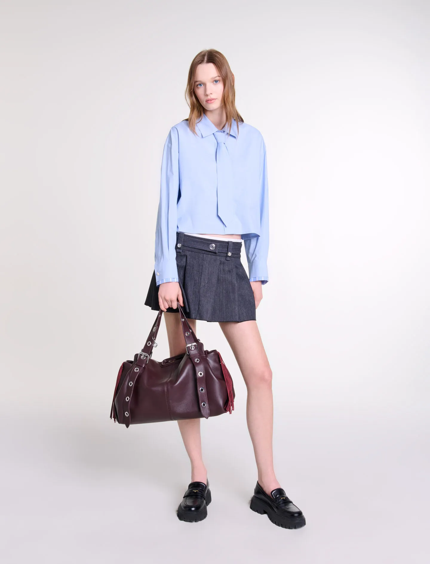 Minifalda negra efecto denim
