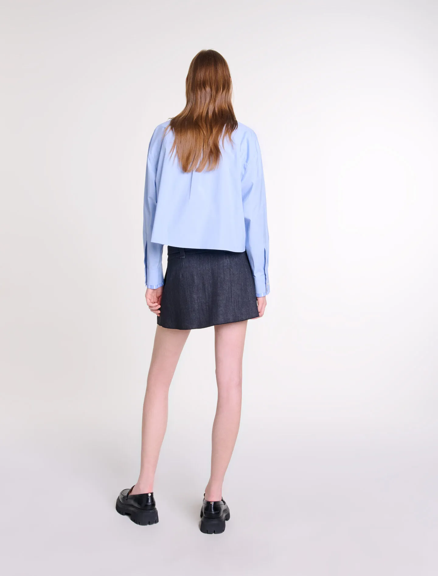 Minifalda negra efecto denim