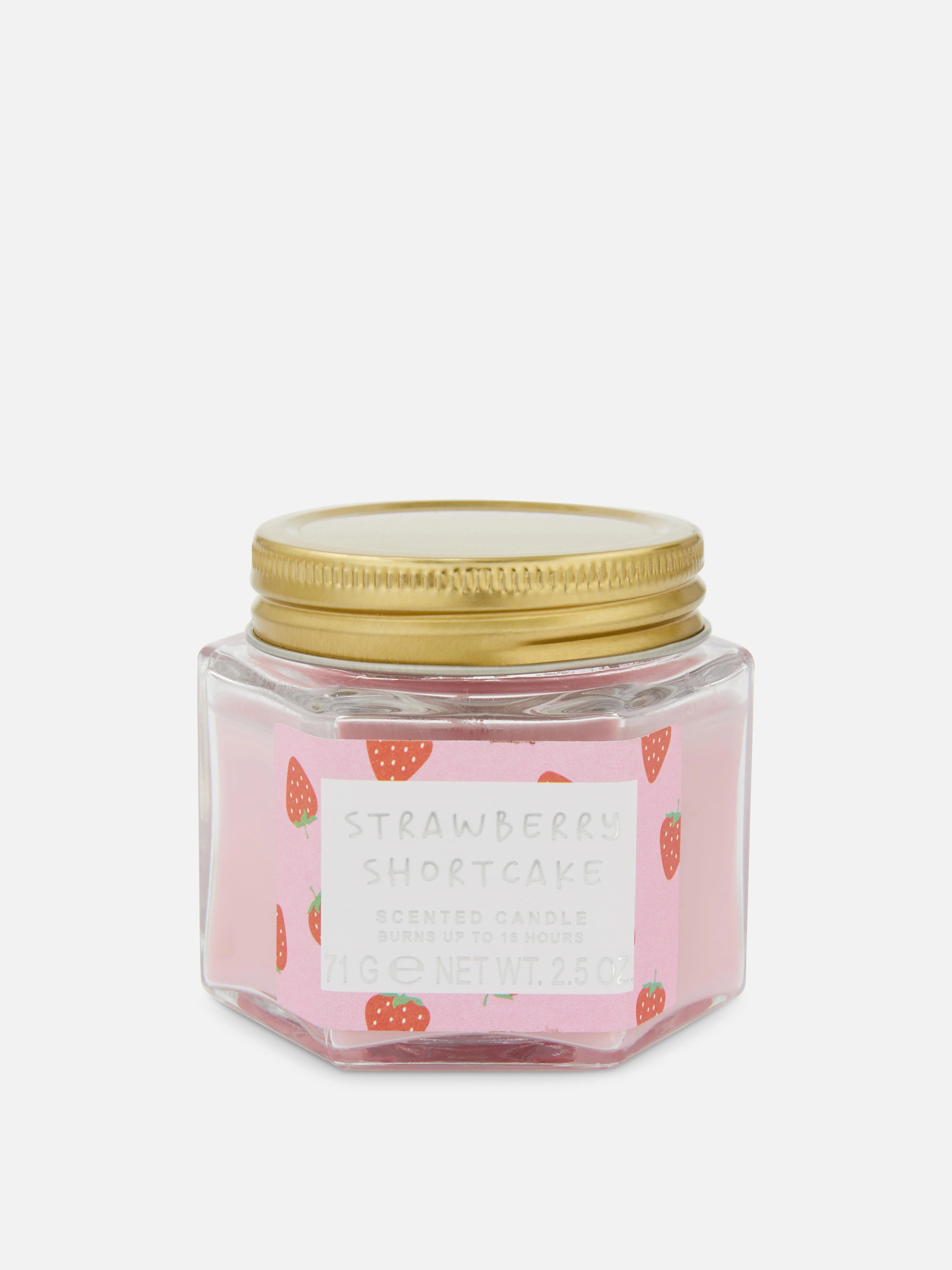 Vela aromática en recipiente pequeño